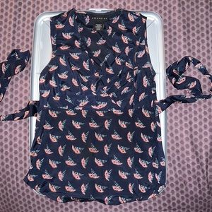 A XSmall dark navy blouse with feather prints